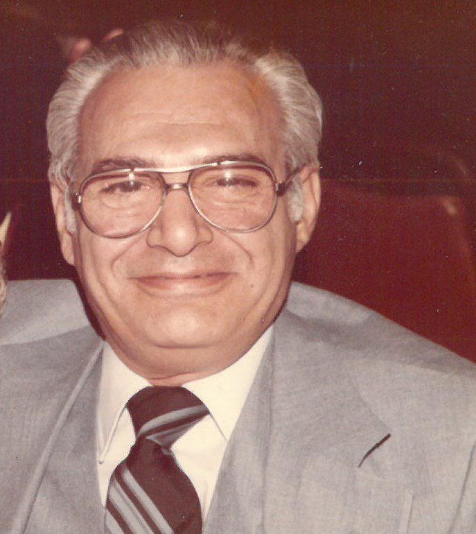 A man in a suit and tie.