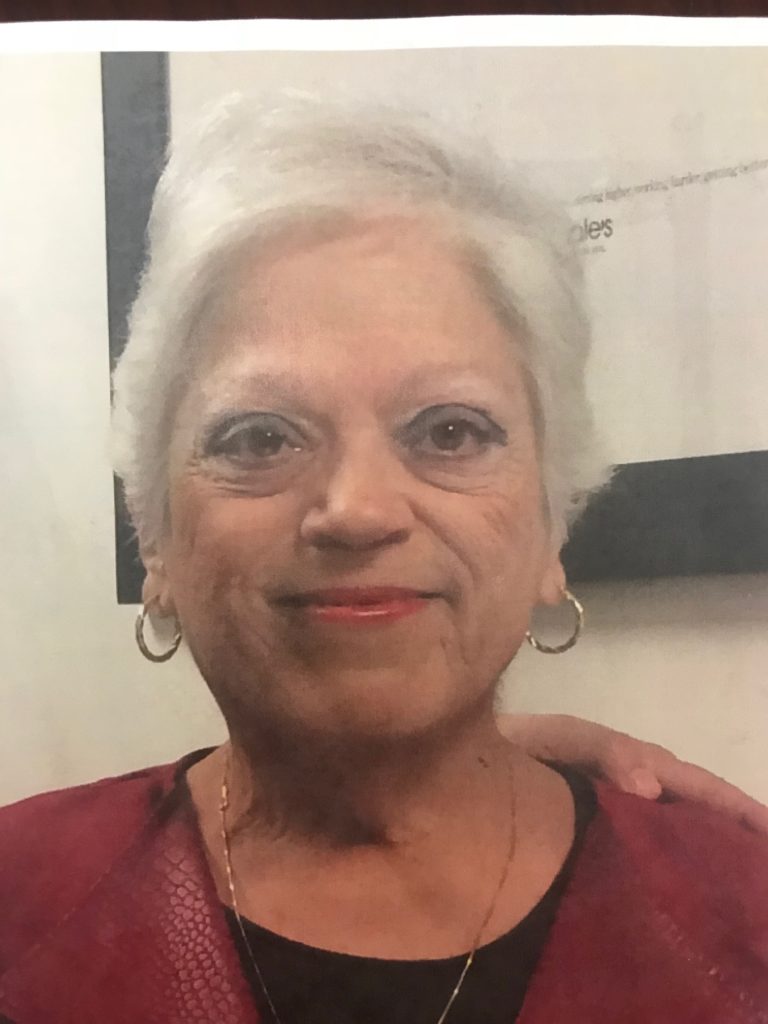 A photo of an older woman with white hair.