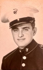 An old photo of a man in uniform.