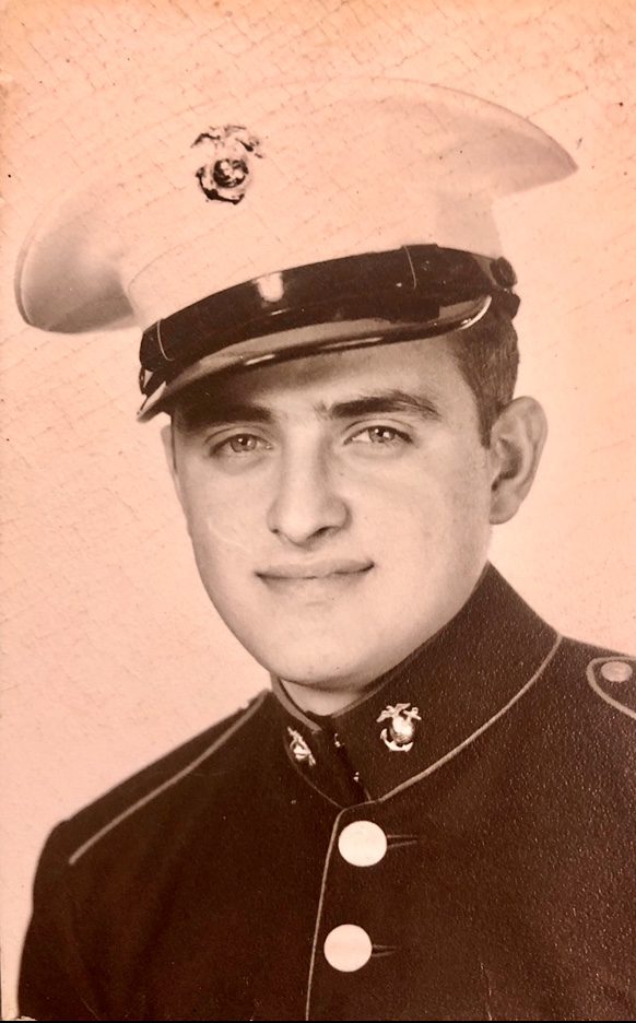 An old photo of a man in uniform.