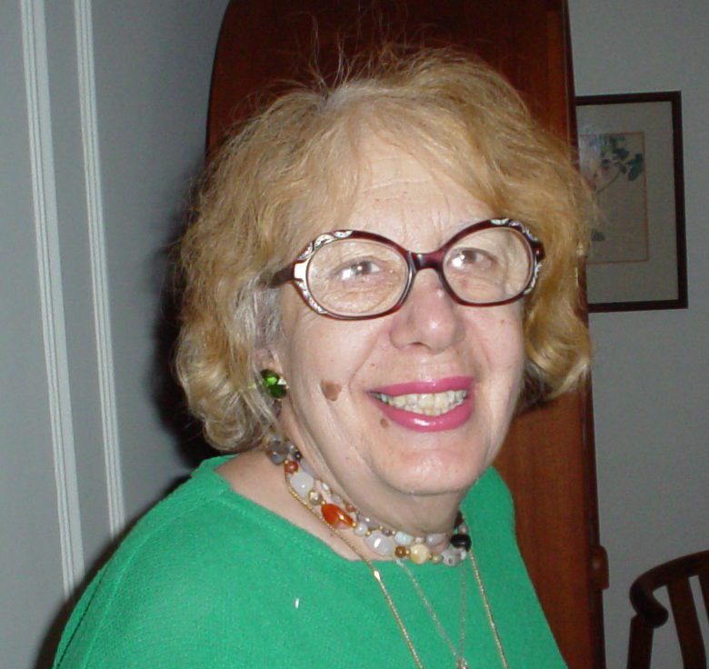A woman wearing glasses.