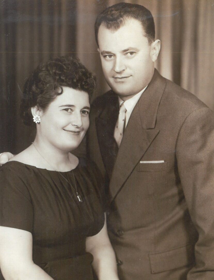 A man and woman posing for a photo.