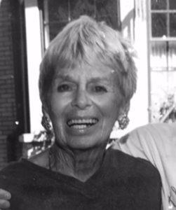 A black and white photo of an older man and woman.