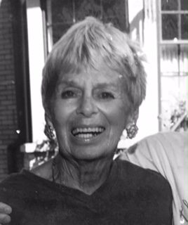 A black and white photo of an older man and woman.