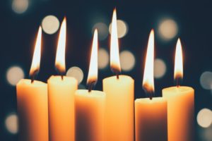 Candles burning in memory at a funeral service