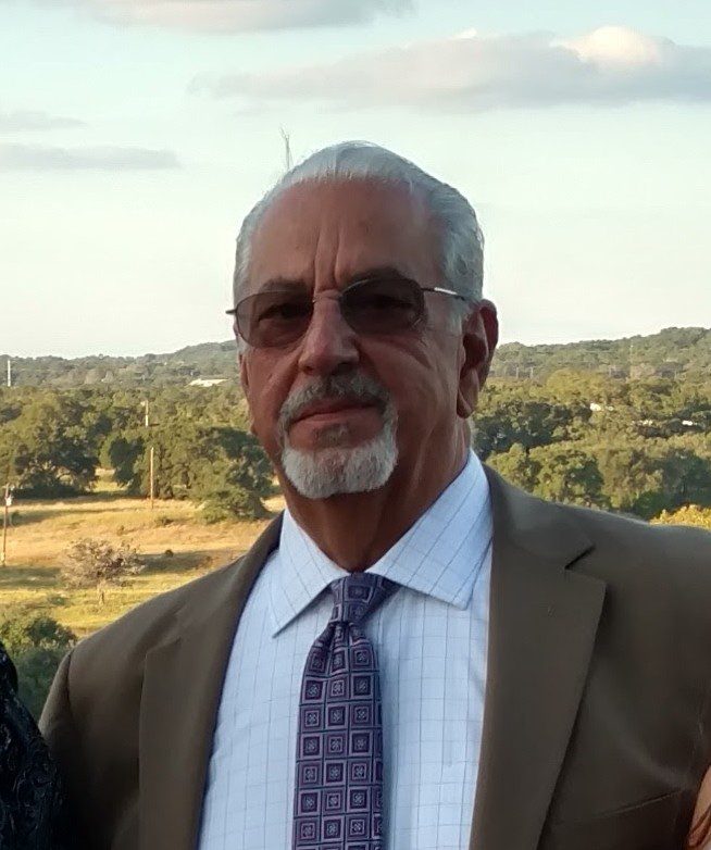 A man and woman posing for a photo.
