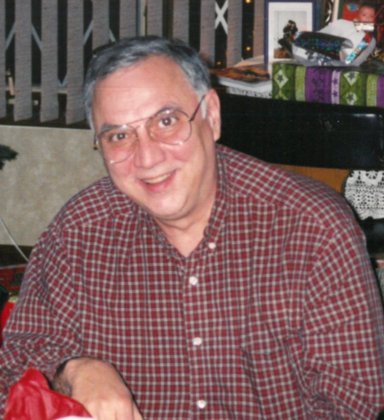 A man in a plaid shirt.