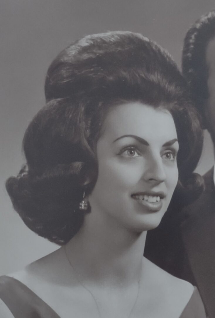 A black and white photo of a man and woman.