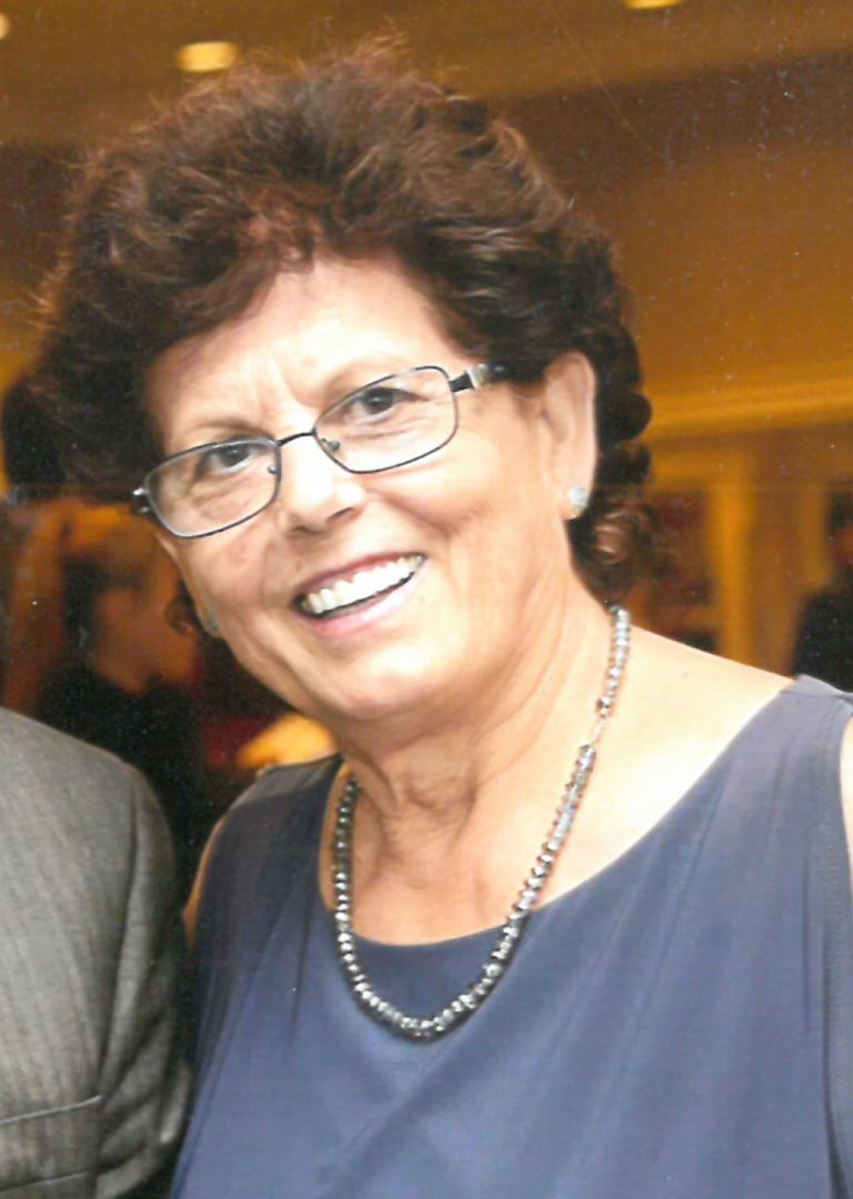 A man and woman smiling for the camera.