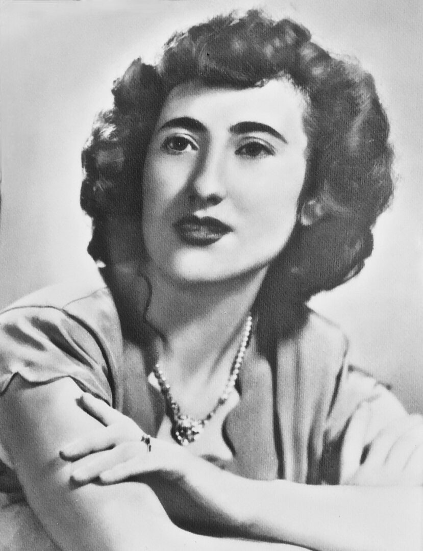 A black and white photo of a woman posing.