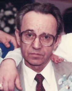 An old man wearing big size glasses