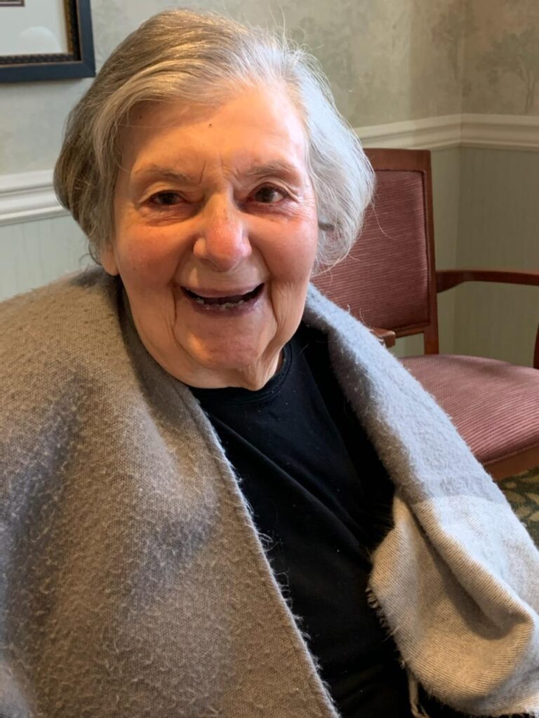 Selfie of an old lady smiling at the camera