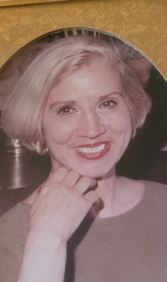Close up image of an old lady smiling at the camera