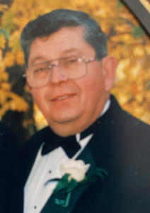 Close up shot of an old man wearing spectacles