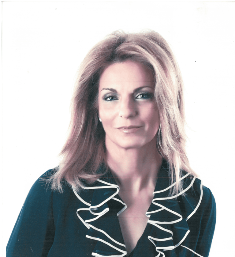 A woman is posing for a photo.