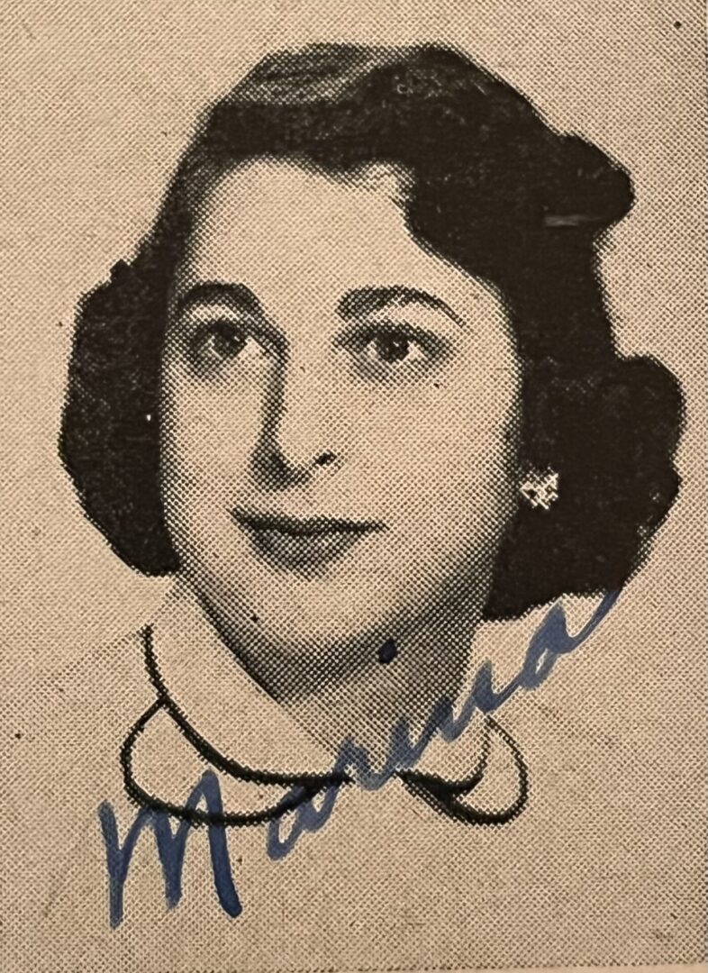 A black and white photo of a woman with a collar.
